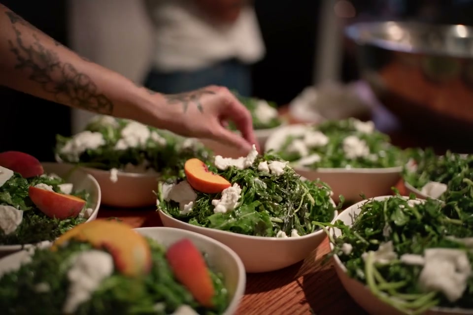 Peach salads lined up for service at the Grain of Salt dinner